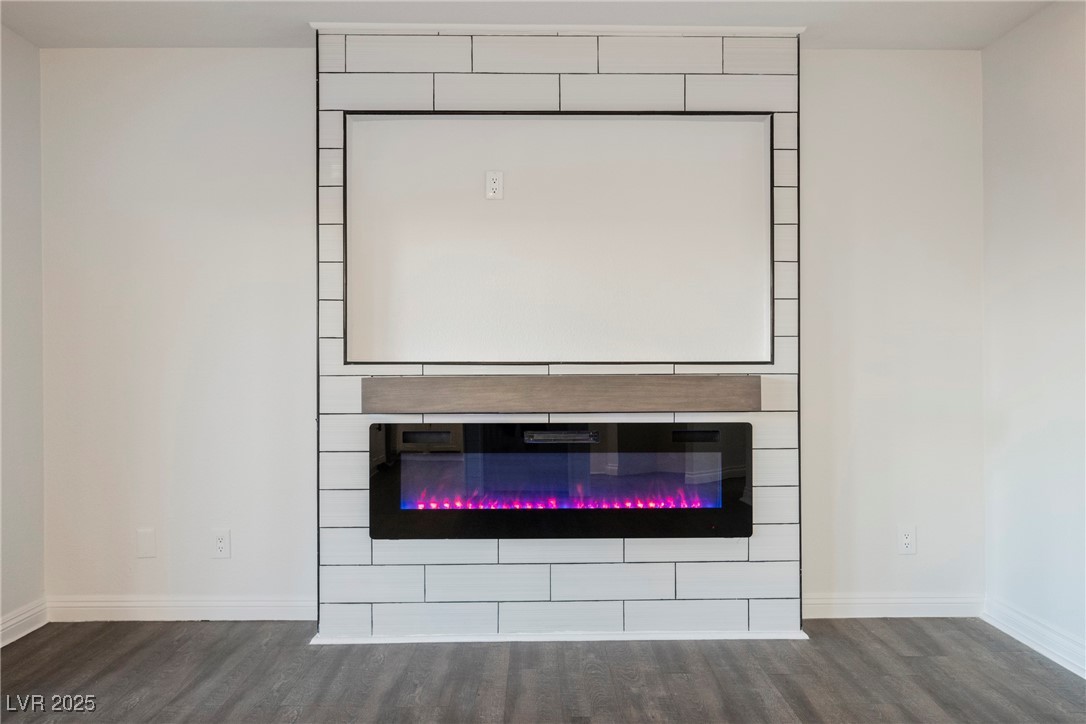 1706 Toltec Circle Henderson, NV 89014 - Photo 7 of 21 Detailed view of a fireplace and wood finished floors