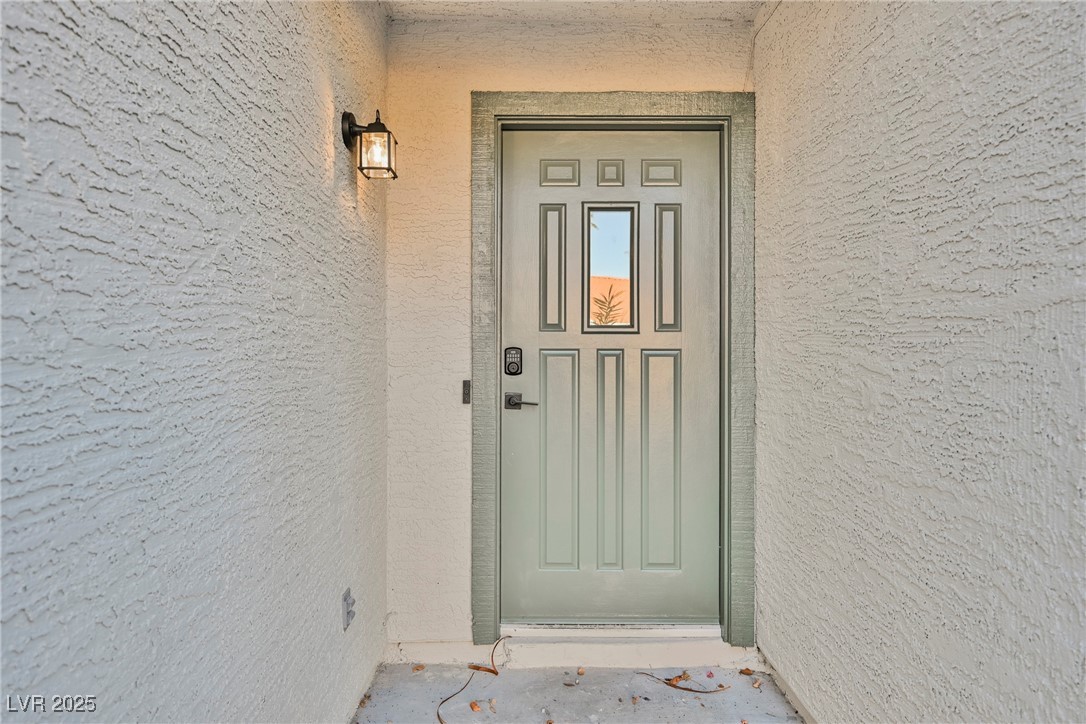 1706 Toltec Circle Henderson, NV 89014 - Photo 8 of 21 Entrance to property featuring stucco siding