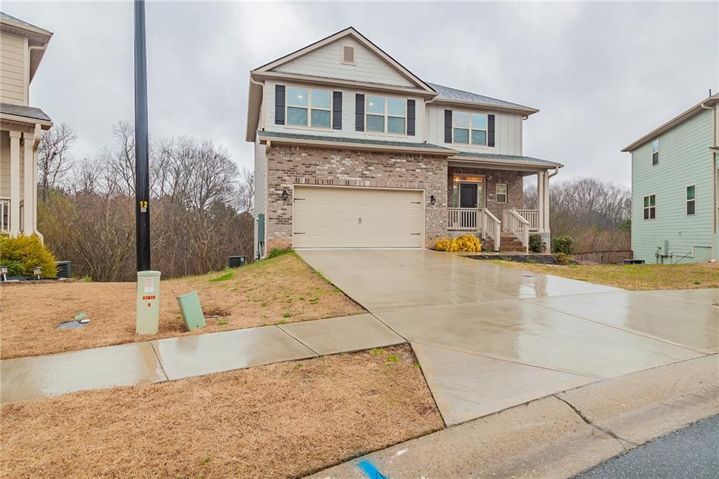 72 Hidden Pines Circle Pendergrass, GA 30567 - Photo 1 of 1 a front view of a house with a yard