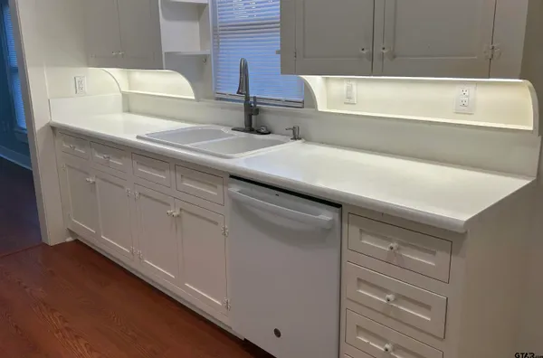 a bathroom with a sink and a bathtub