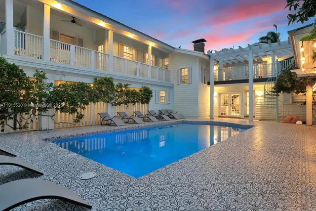 a view of a house with a swimming pool