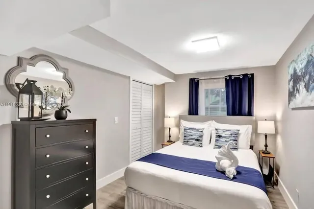 a bathroom with a toilet sink and shower