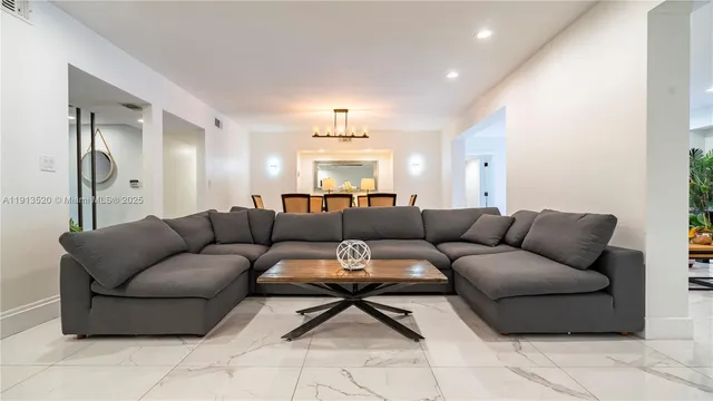 a living room with furniture and a couch