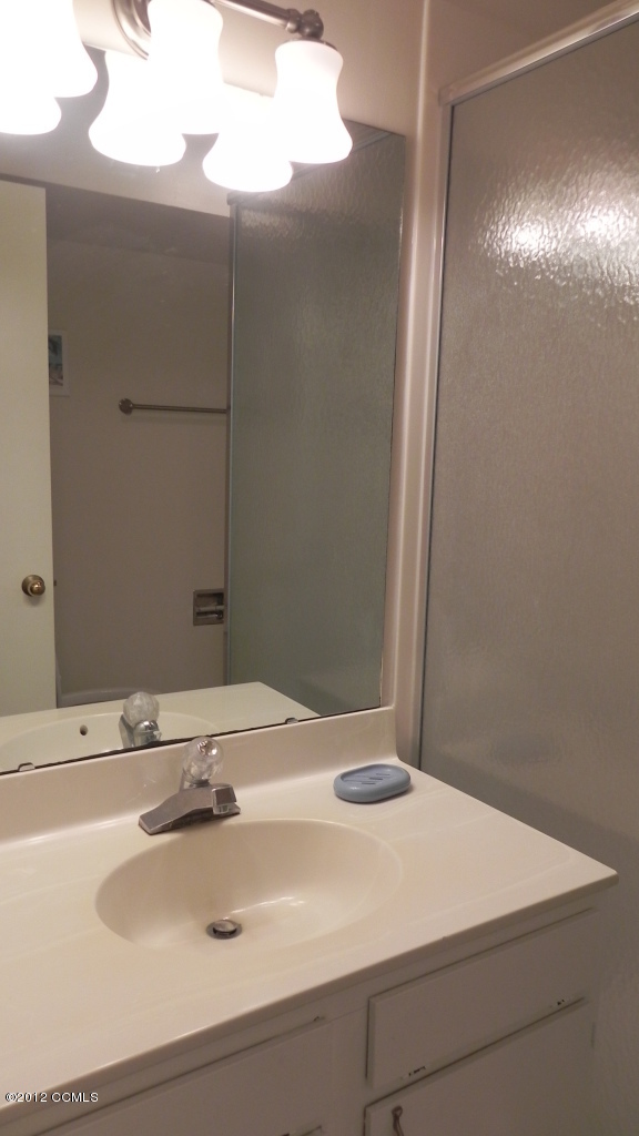 1505 Salter Path Road, Unit 229 Indian Beach, NC 28512 - Photo 13 of 26 Hall bath vanity