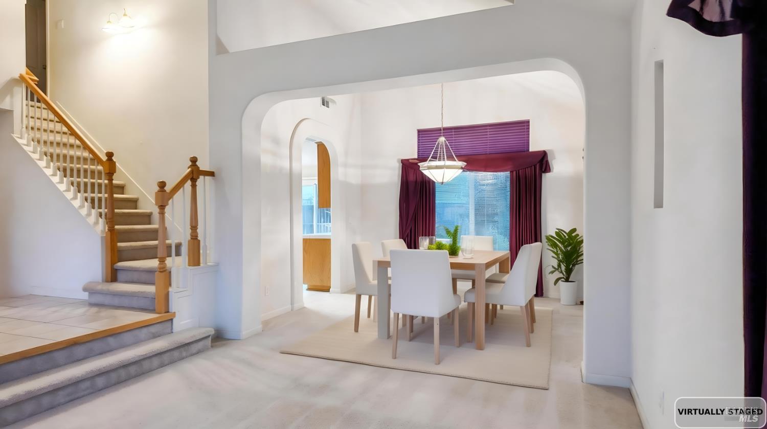 4124 Singletree Way Fairfield, CA 94533 - Photo 11 of 43 a dining room with furniture and window