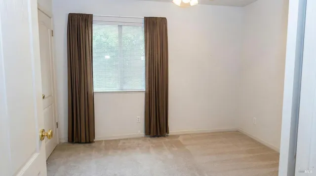a bathroom with a sink toilet vanity and tub