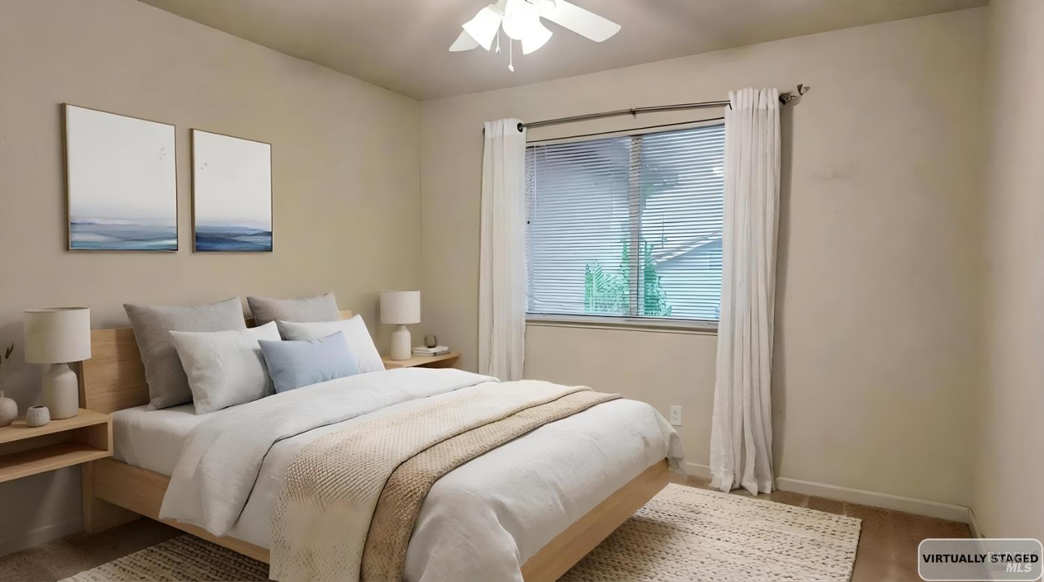 4124 Singletree Way Fairfield, CA 94533 - Photo 41 of 43 a bedroom with a bed and a window