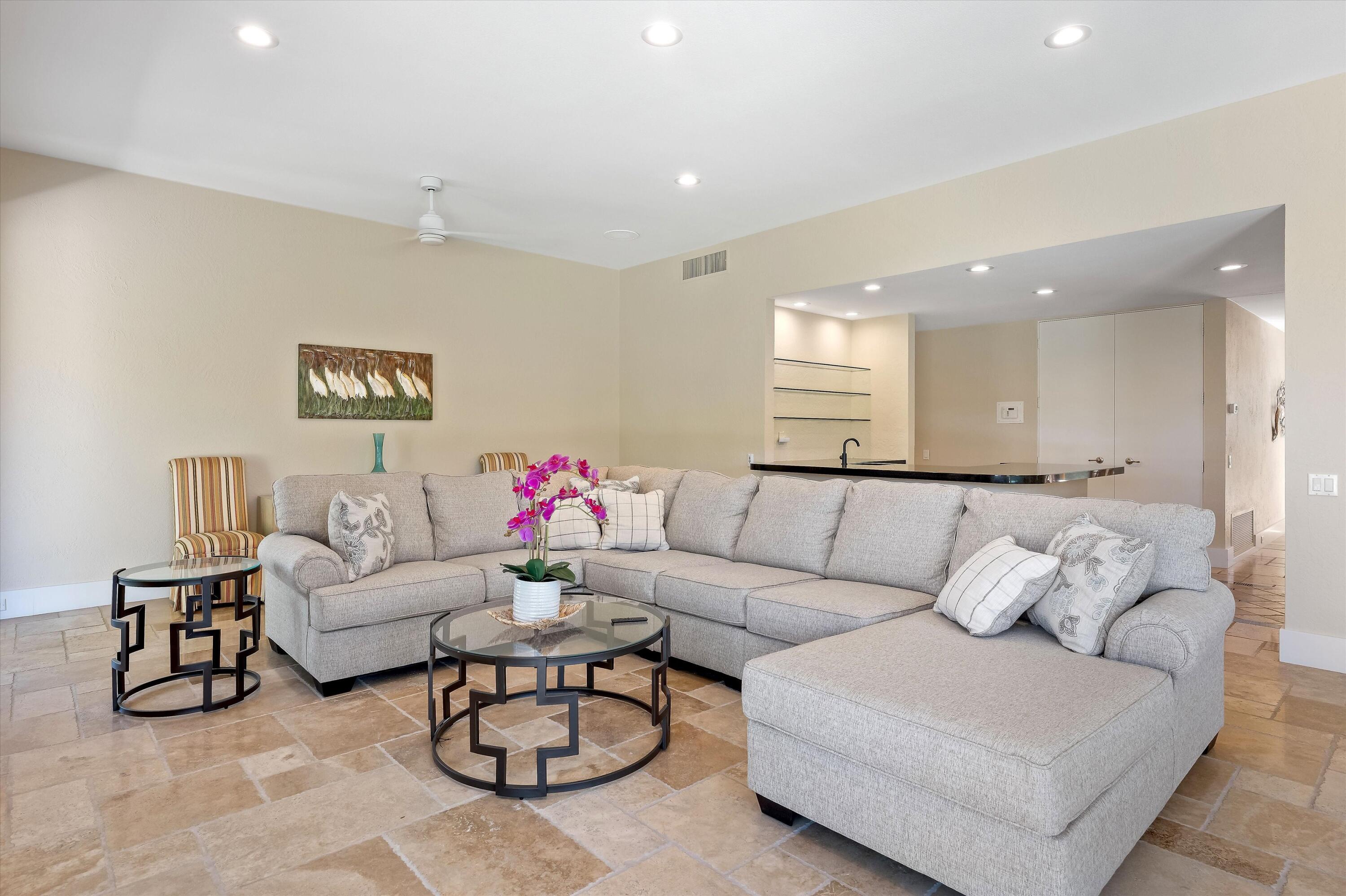 62 Dartmouth Drive Rancho Mirage, CA 92270 - Photo 19 of 46 a living room with furniture and a rug
