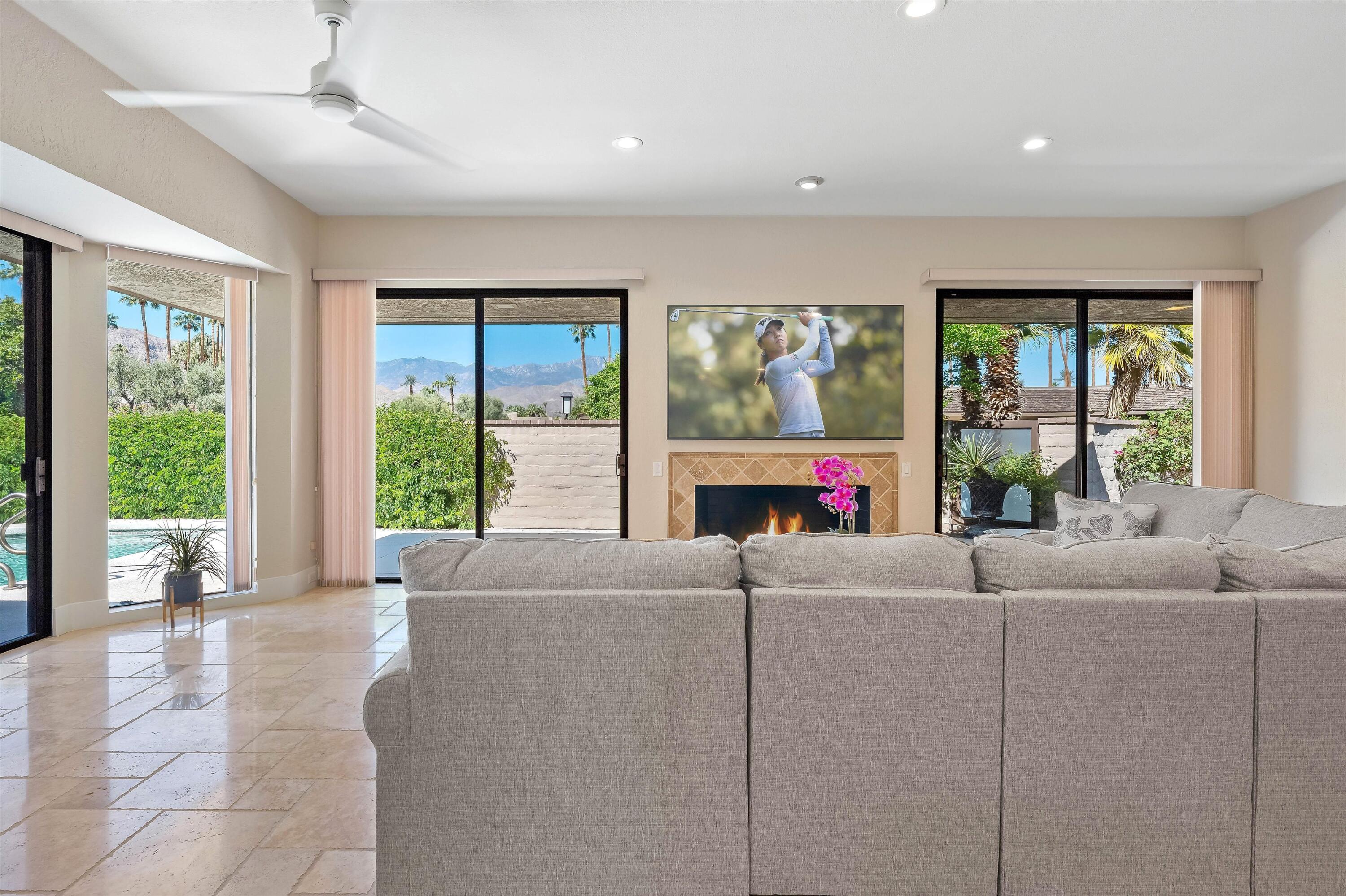 62 Dartmouth Drive Rancho Mirage, CA 92270 - Photo 21 of 46 a living room with furniture and a large window