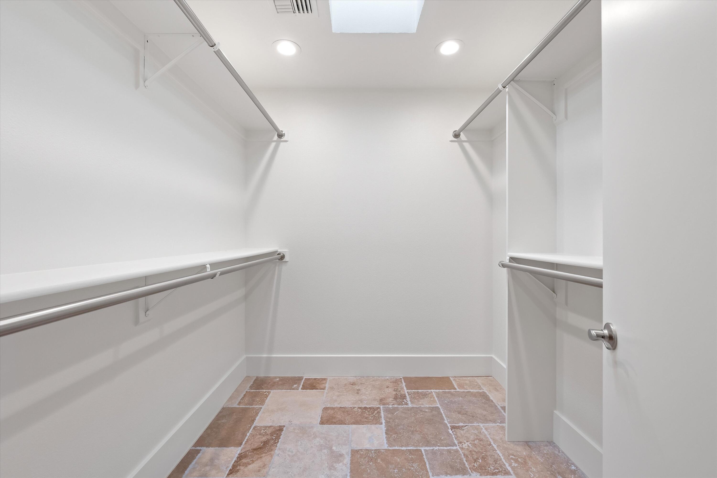 62 Dartmouth Drive Rancho Mirage, CA 92270 - Photo 25 of 46 a view of an empty walk in closet