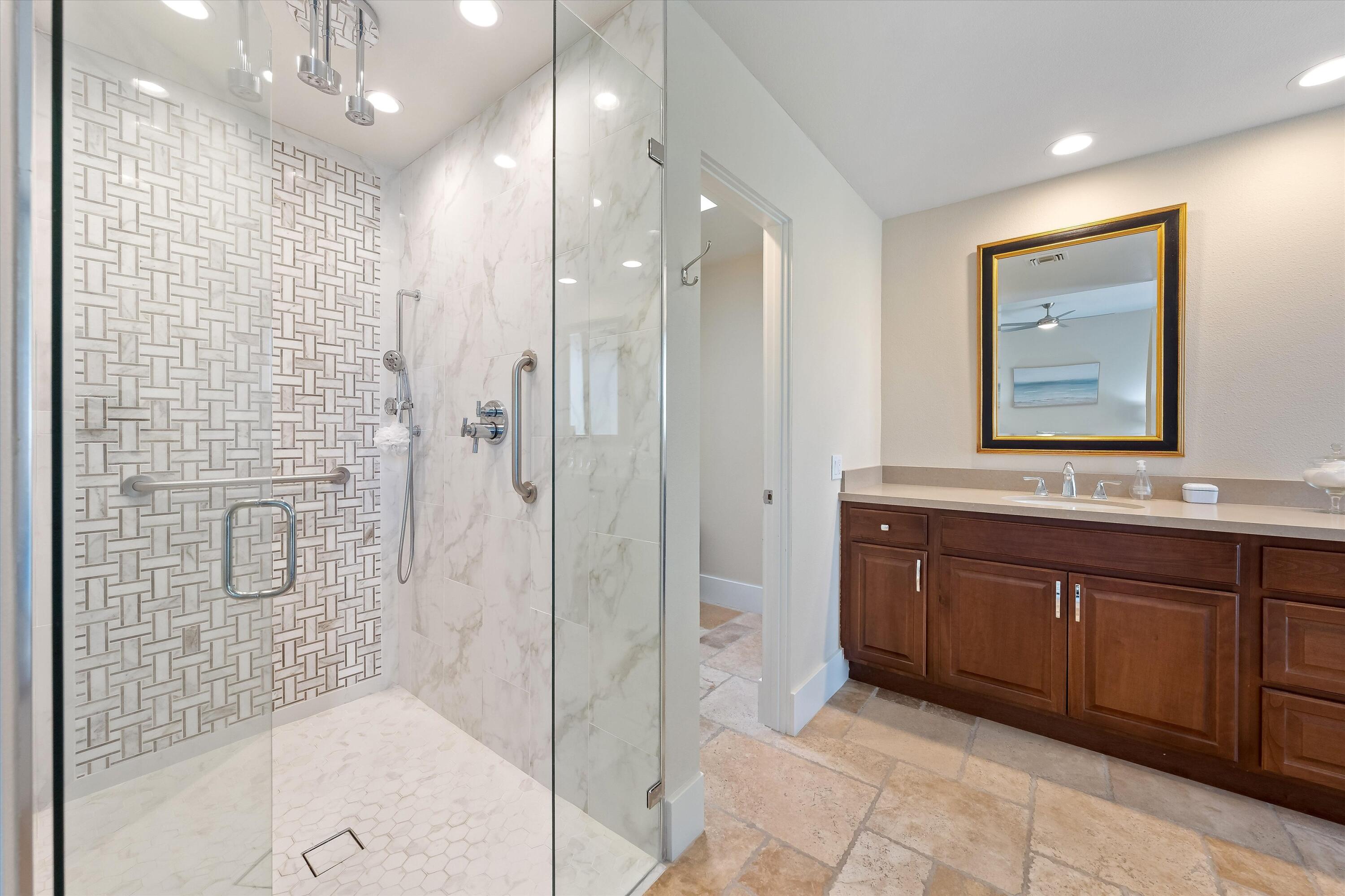 62 Dartmouth Drive Rancho Mirage, CA 92270 - Photo 26 of 46 a bathroom with a double vanity sink mirror and shower