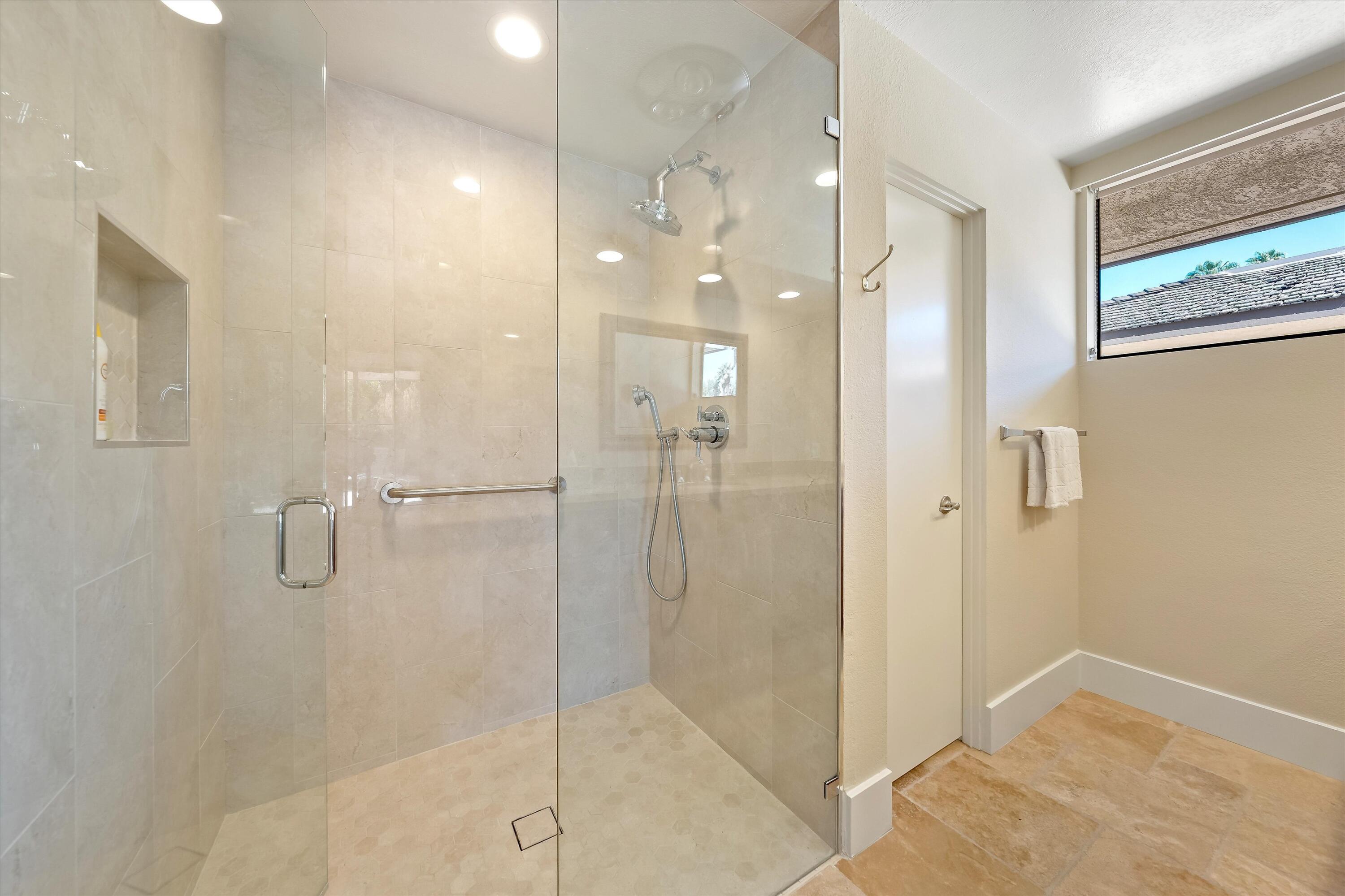 62 Dartmouth Drive Rancho Mirage, CA 92270 - Photo 31 of 46 a bathroom with a shower