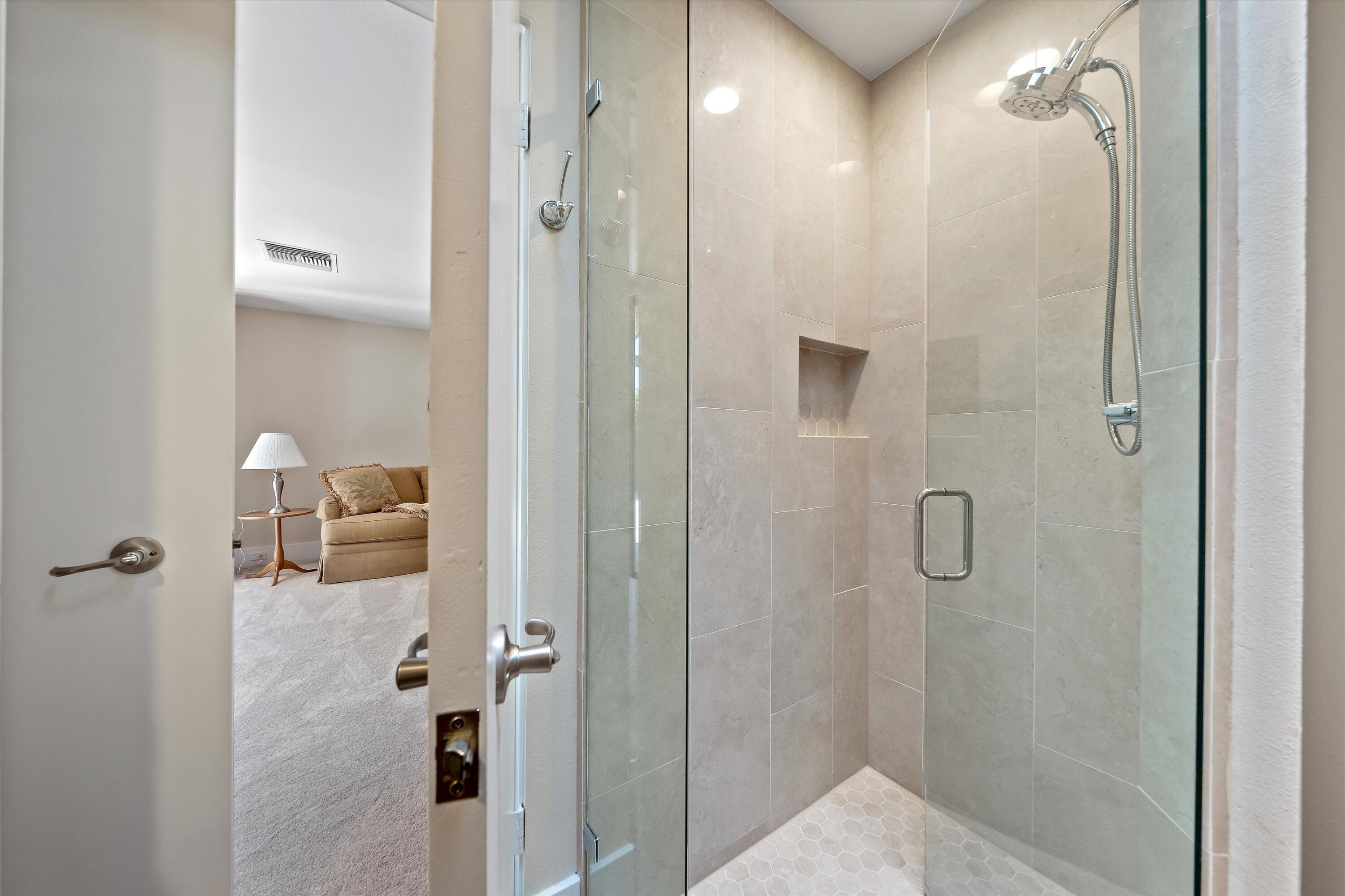 62 Dartmouth Drive Rancho Mirage, CA 92270 - Photo 36 of 46 a bathroom with a shower