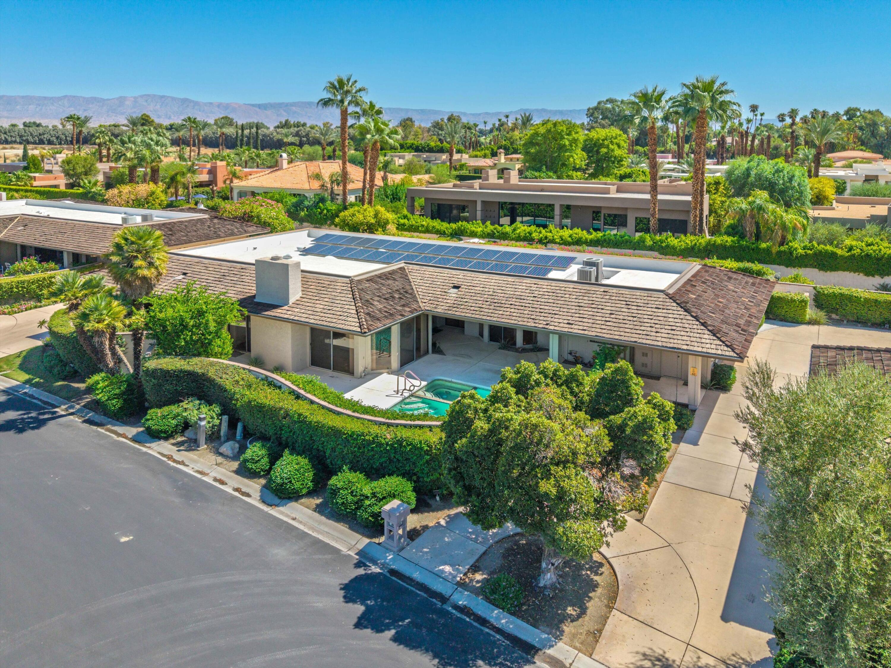 62 Dartmouth Drive Rancho Mirage, CA 92270 - Photo 44 of 46 an aerial view of a house with a garden