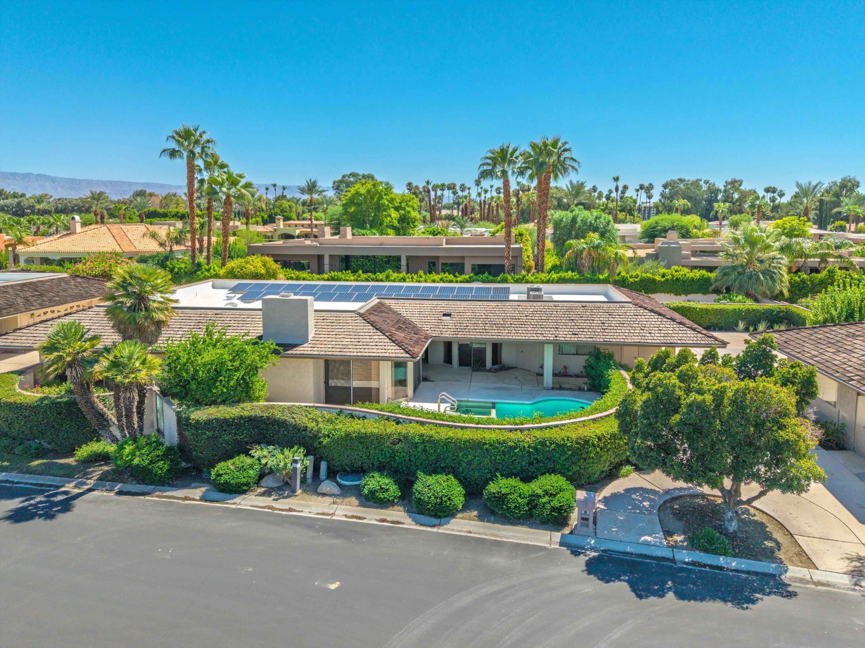 62 Dartmouth Drive Rancho Mirage, CA 92270 - Photo 45 of 46 a front view of a house with garden