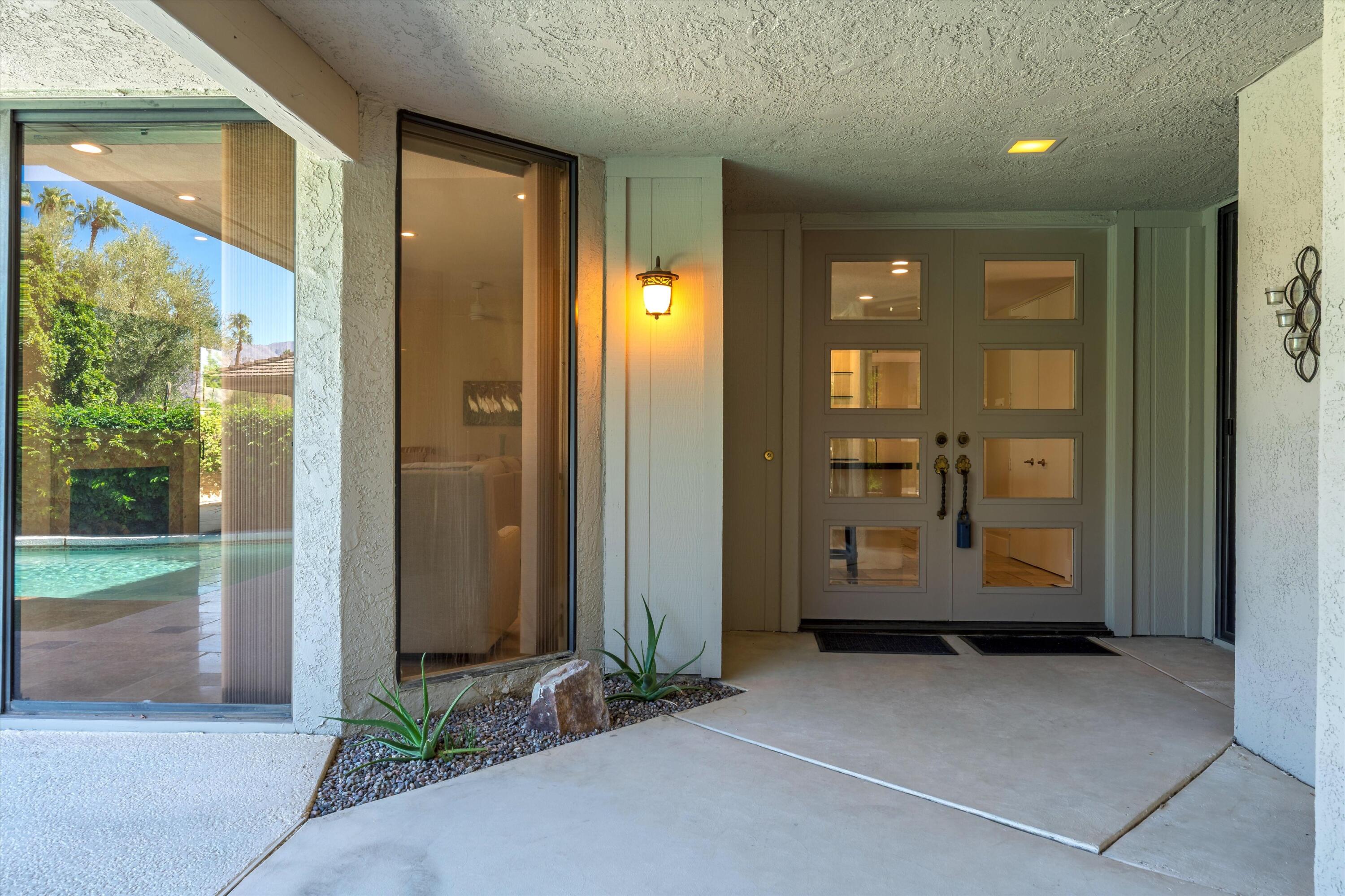 62 Dartmouth Drive Rancho Mirage, CA 92270 - Photo 7 of 46 a view of a entryway door of the house