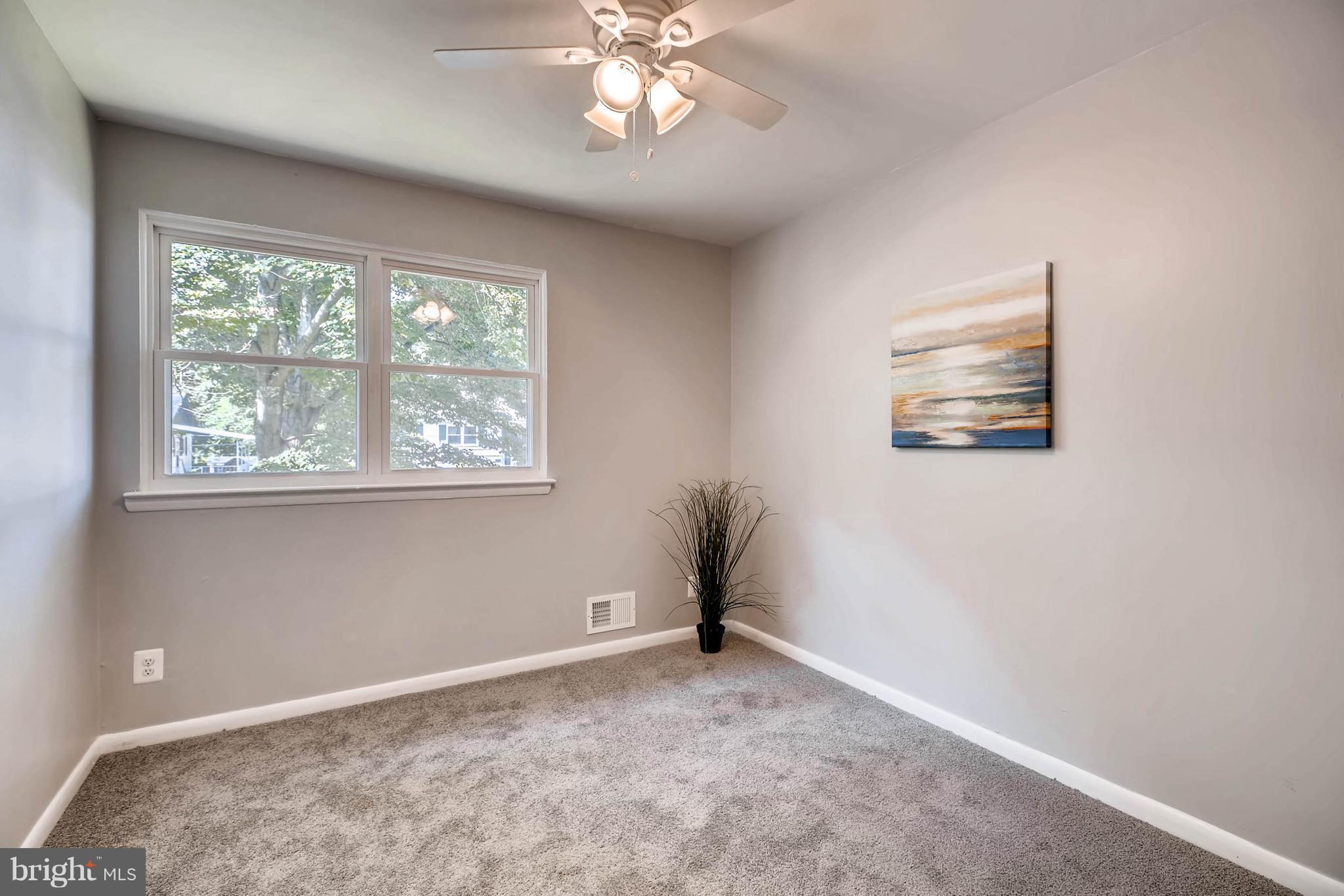 9020 Hamor Road Randallstown, MD 21133 - Photo 12 of 24 a view of an empty room with a window
