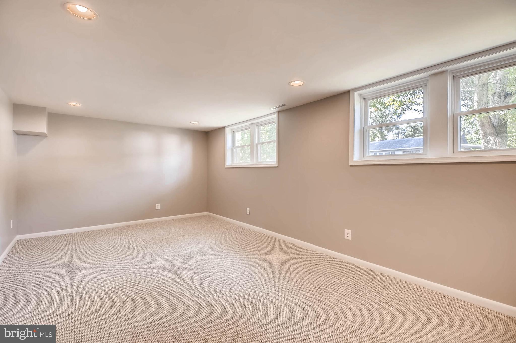 9020 Hamor Road Randallstown, MD 21133 - Photo 18 of 24 an empty room with windows
