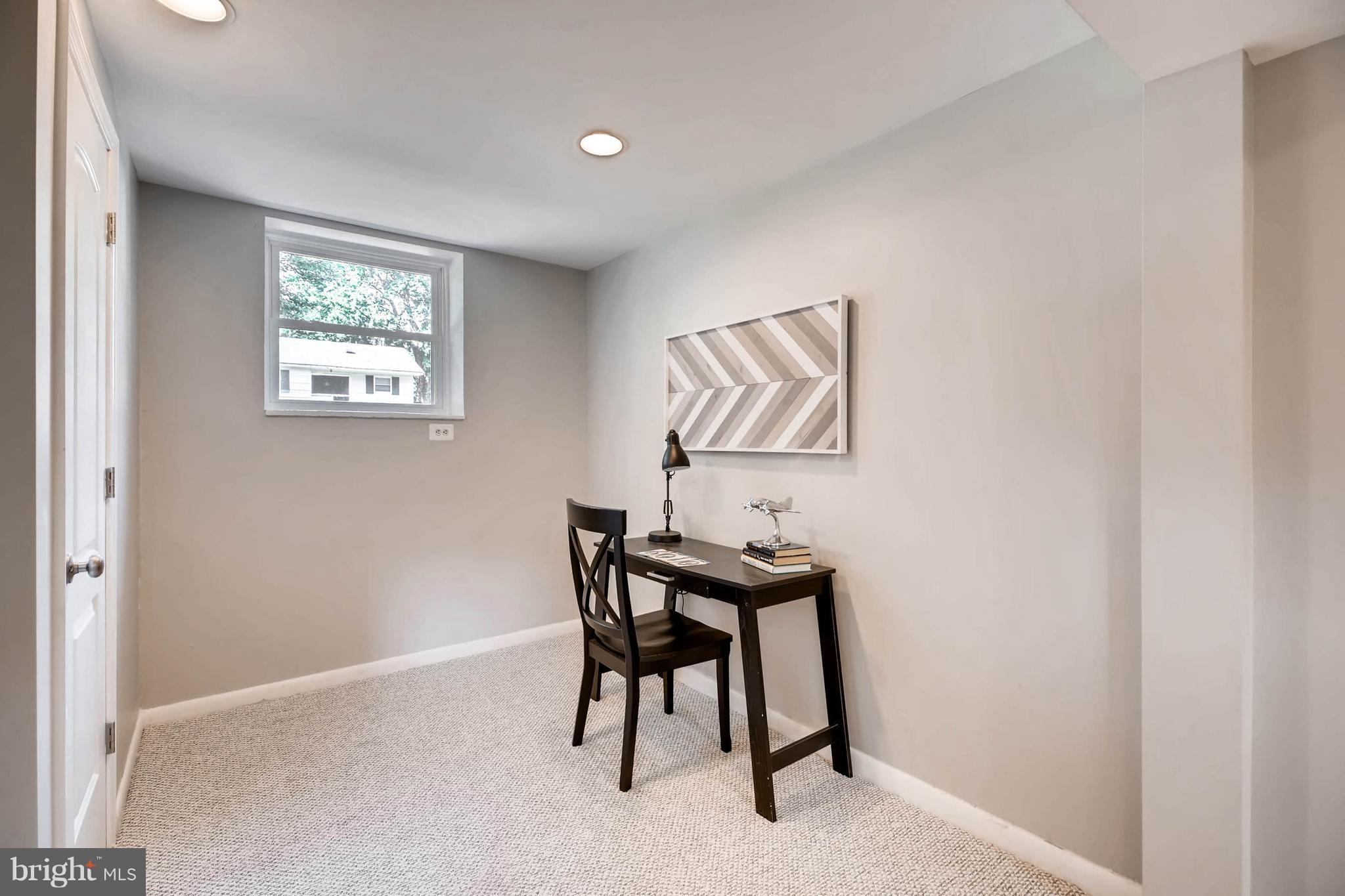 9020 Hamor Road Randallstown, MD 21133 - Photo 21 of 24 a view of a workspace with furniture and window in a room