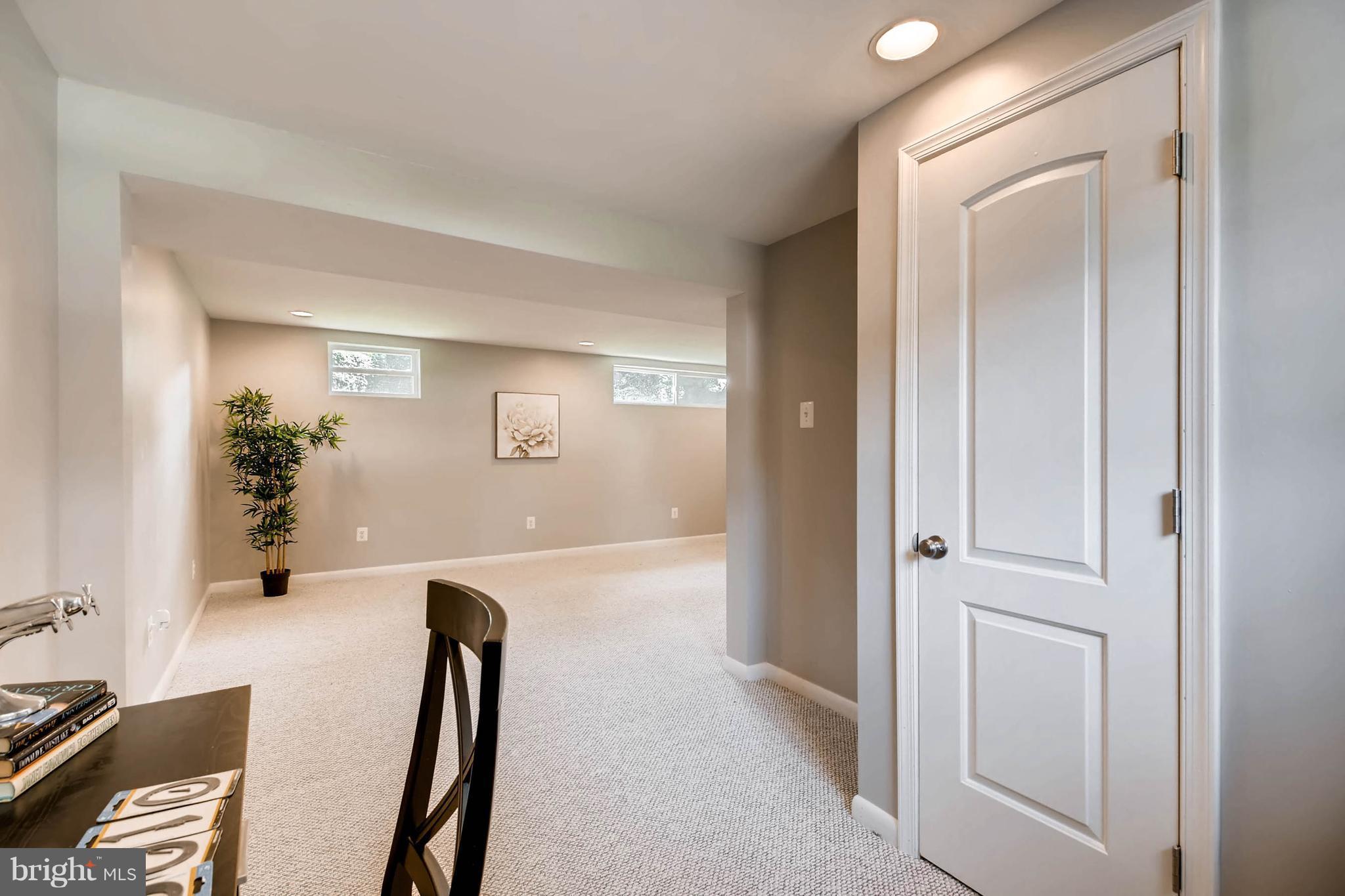 9020 Hamor Road Randallstown, MD 21133 - Photo 22 of 24 a view of a hallway with workspace