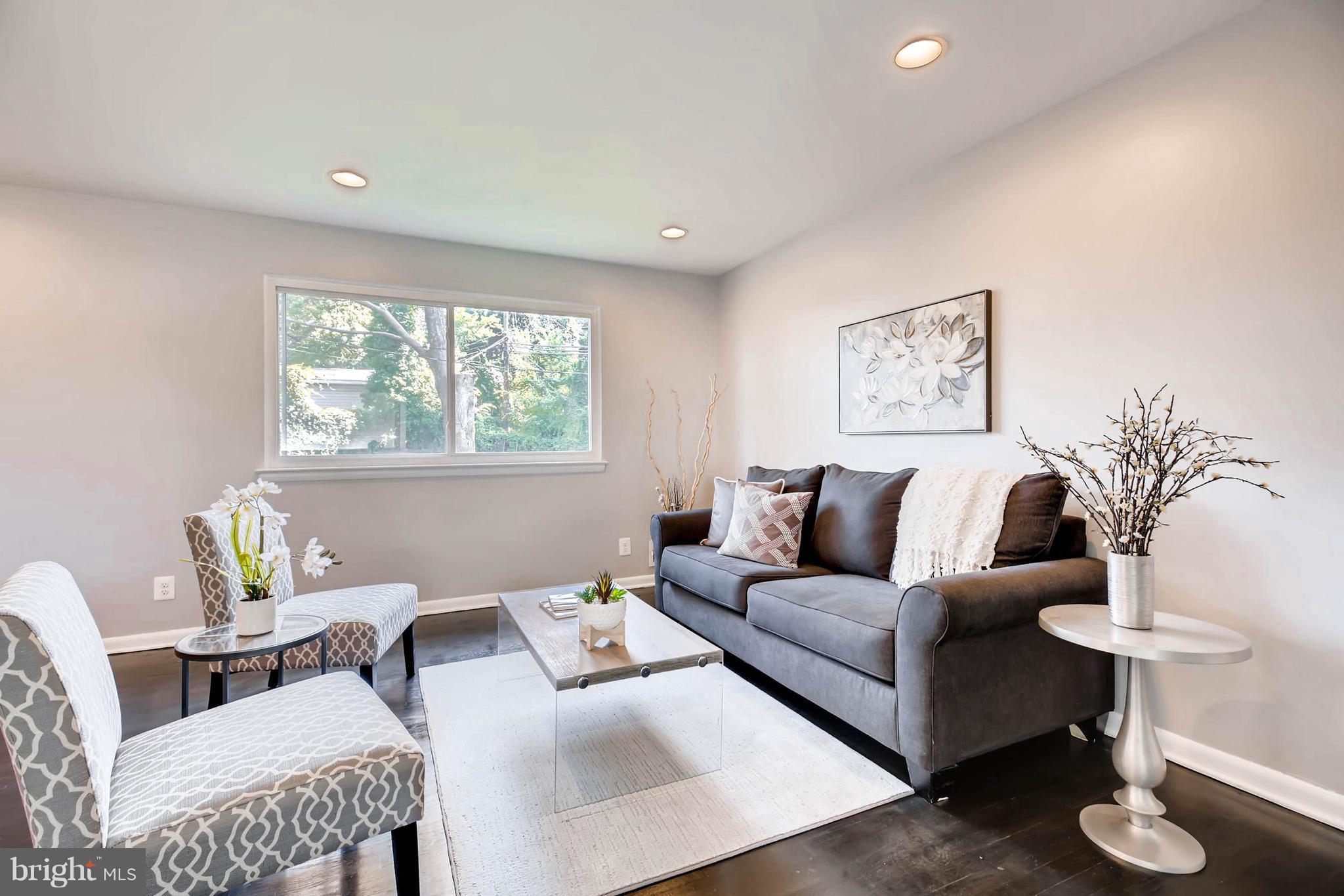 9020 Hamor Road Randallstown, MD 21133 - Photo 5 of 24 a living room with furniture and a large window