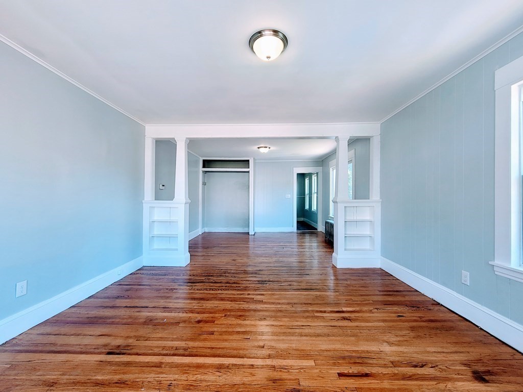 33-35 Algonquin Place Springfield, MA 01104 - Photo 3 of 10 a view of empty room with wooden floor