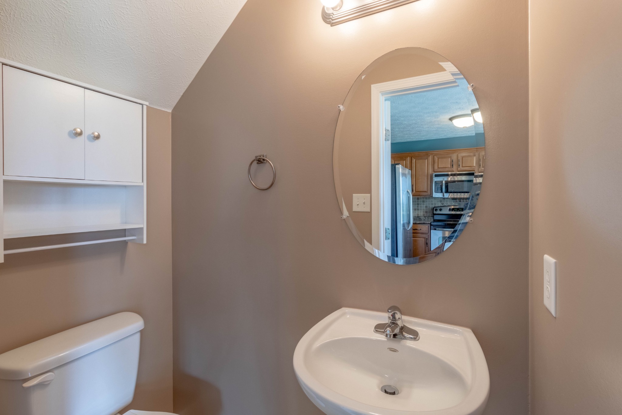 11241 Bell Station Road Oak Grove, KY 42262 - Photo 15 of 33 a bathroom with a toilet sink and mirror