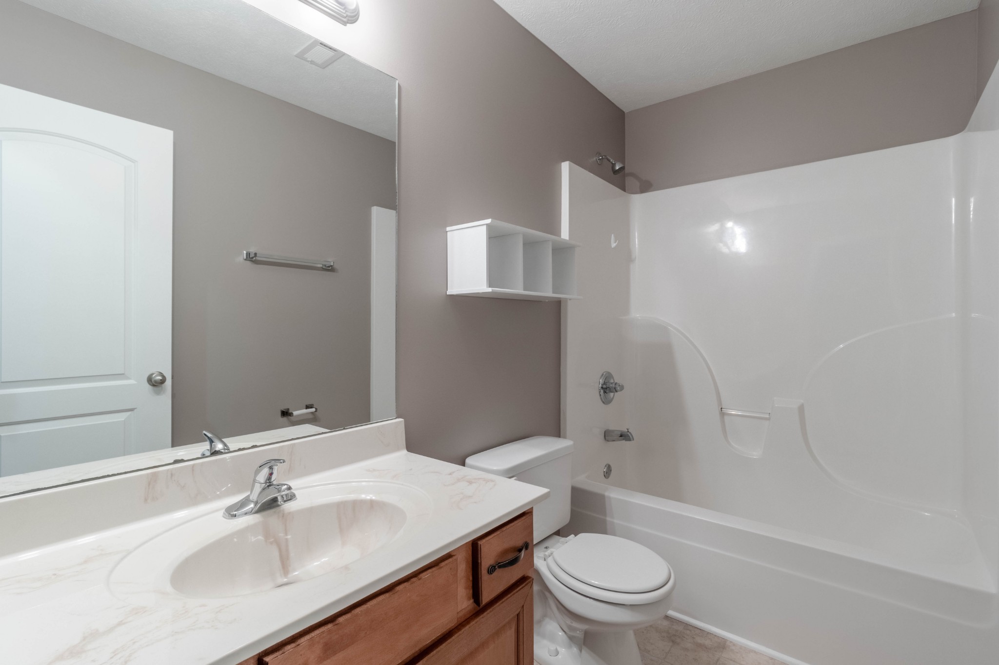 11241 Bell Station Road Oak Grove, KY 42262 - Photo 25 of 33 a bathroom with a sink toilet and shower