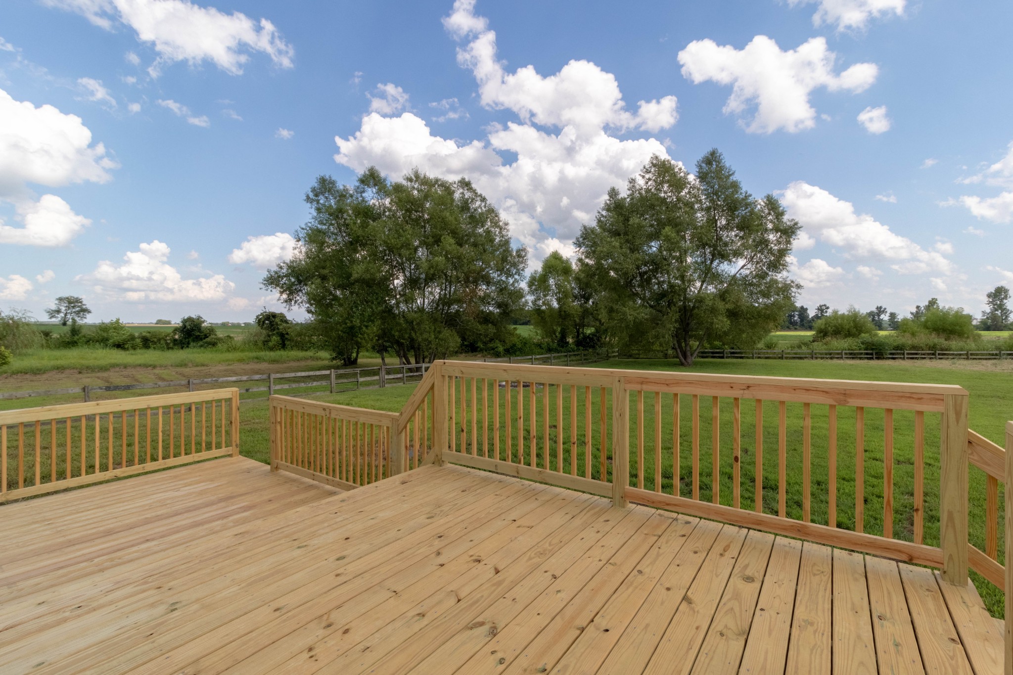 11241 Bell Station Road Oak Grove, KY 42262 - Photo 26 of 33 a view of a balcony with wooden floor