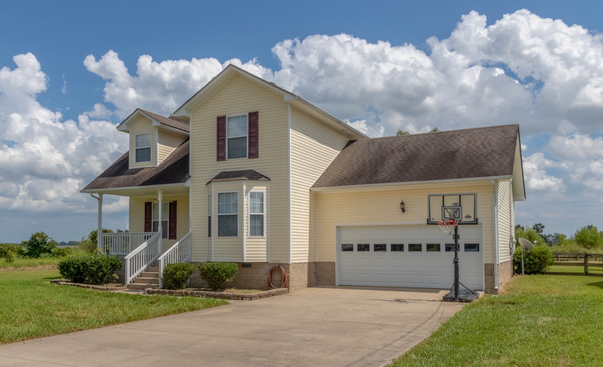 11241 Bell Station Road Oak Grove, KY 42262 - Photo 4 of 33 a front view of a house with a yard