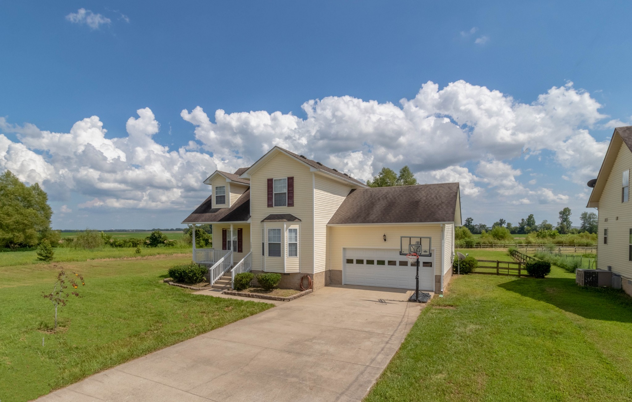 11241 Bell Station Road Oak Grove, KY 42262 - Photo 5 of 33 a front view of a house with garden