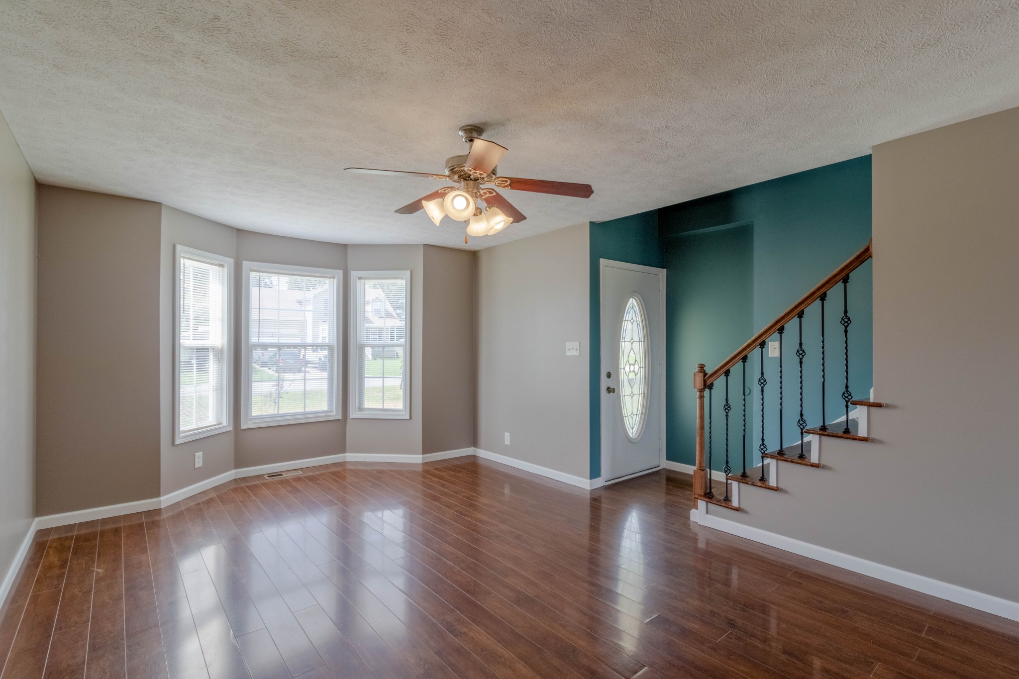 11241 Bell Station Road Oak Grove, KY 42262 - Photo 7 of 33 a view of an entryway with wooden floor and stairs