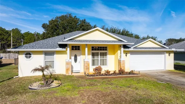$330,000 | 13 Brownstone Lane, Palm Coast, FL 32137
