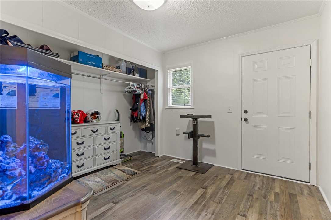 404 Davis Road Liberty, SC 29657 - Photo 23 of 39 Functional entry area with durable wood-look flooring and convenient open shelving.