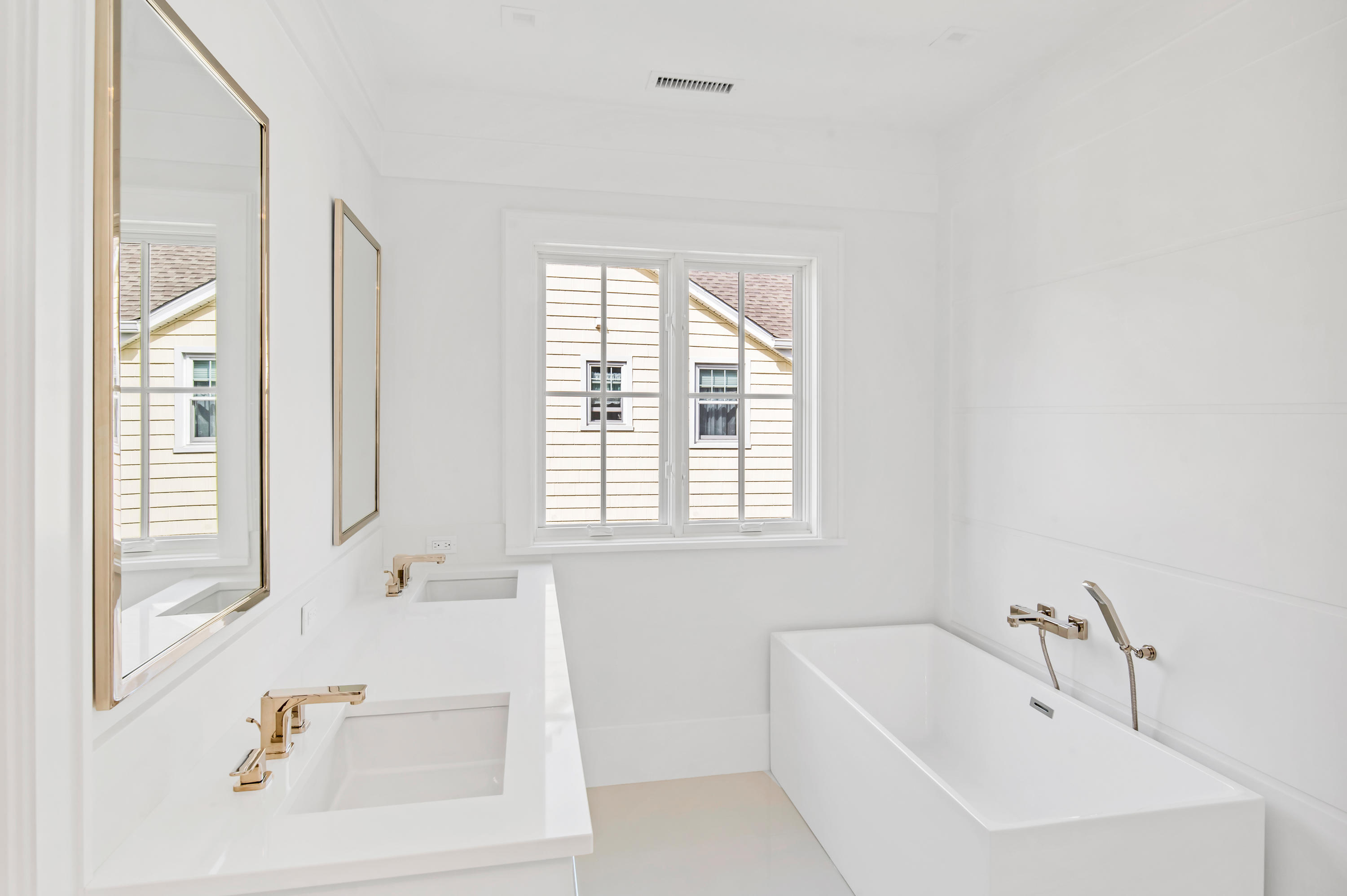 11 Anthony Place Riverside, CT 06878 - Photo 15 of 29 a white bath tub sitting next to a white sink