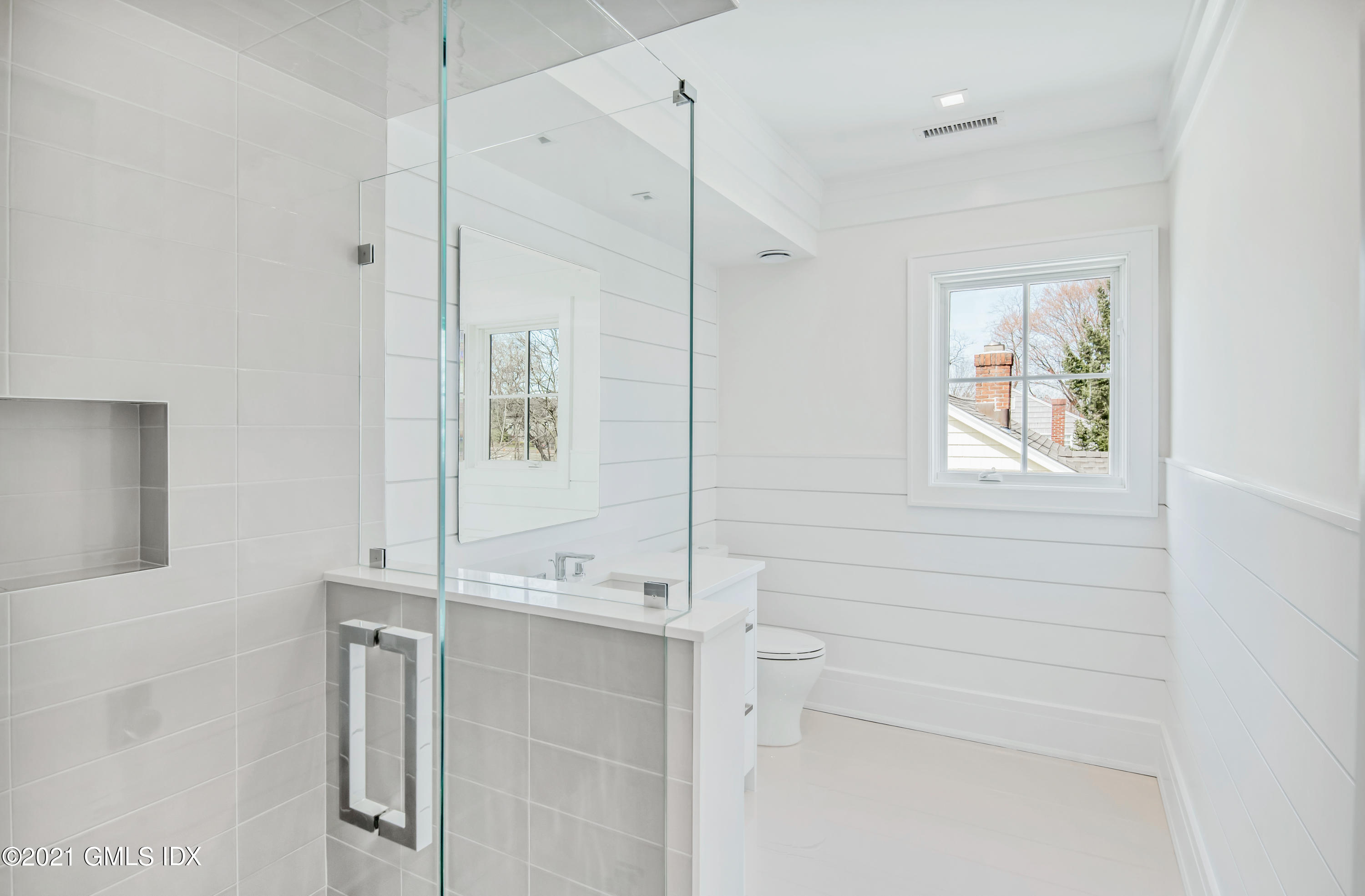 11 Anthony Place Riverside, CT 06878 - Photo 21 of 29 a bathroom with a bathtub and a shower