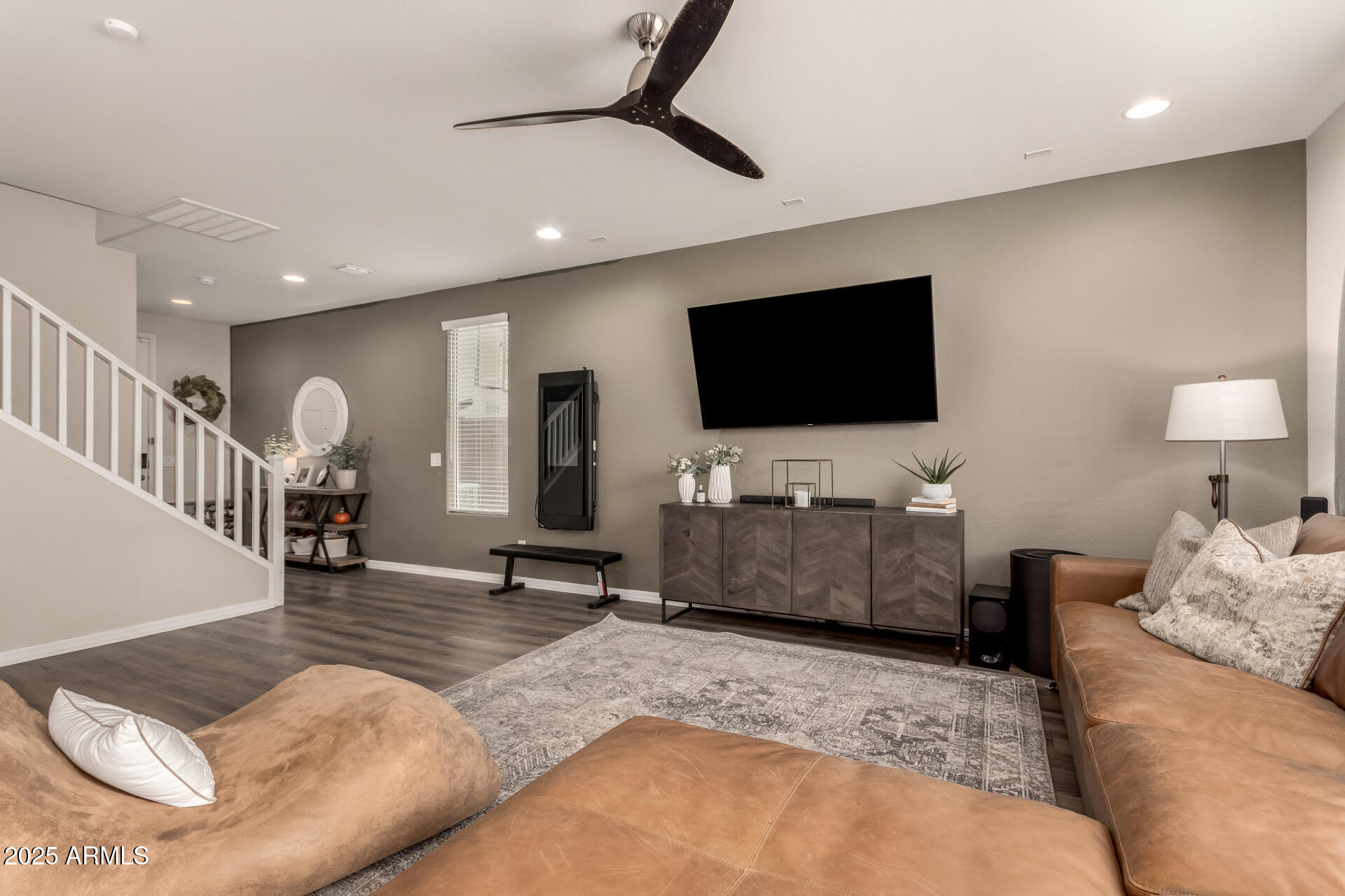 5418 South Vincent Mesa, AZ 85212 - Photo 12 of 38 a living room with furniture and a flat screen tv