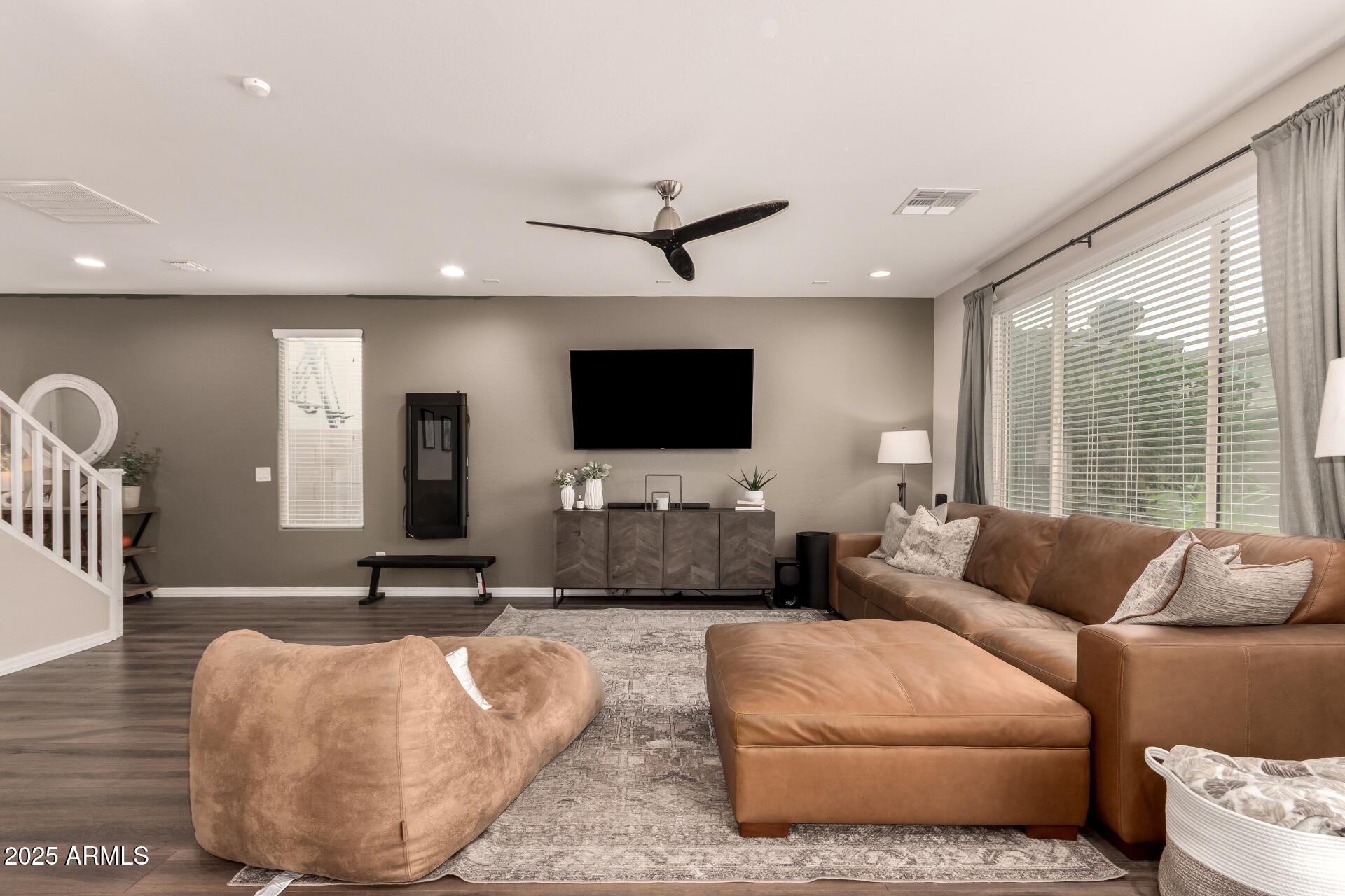 5418 South Vincent Mesa, AZ 85212 - Photo 13 of 38 a living room with furniture and a flat screen tv