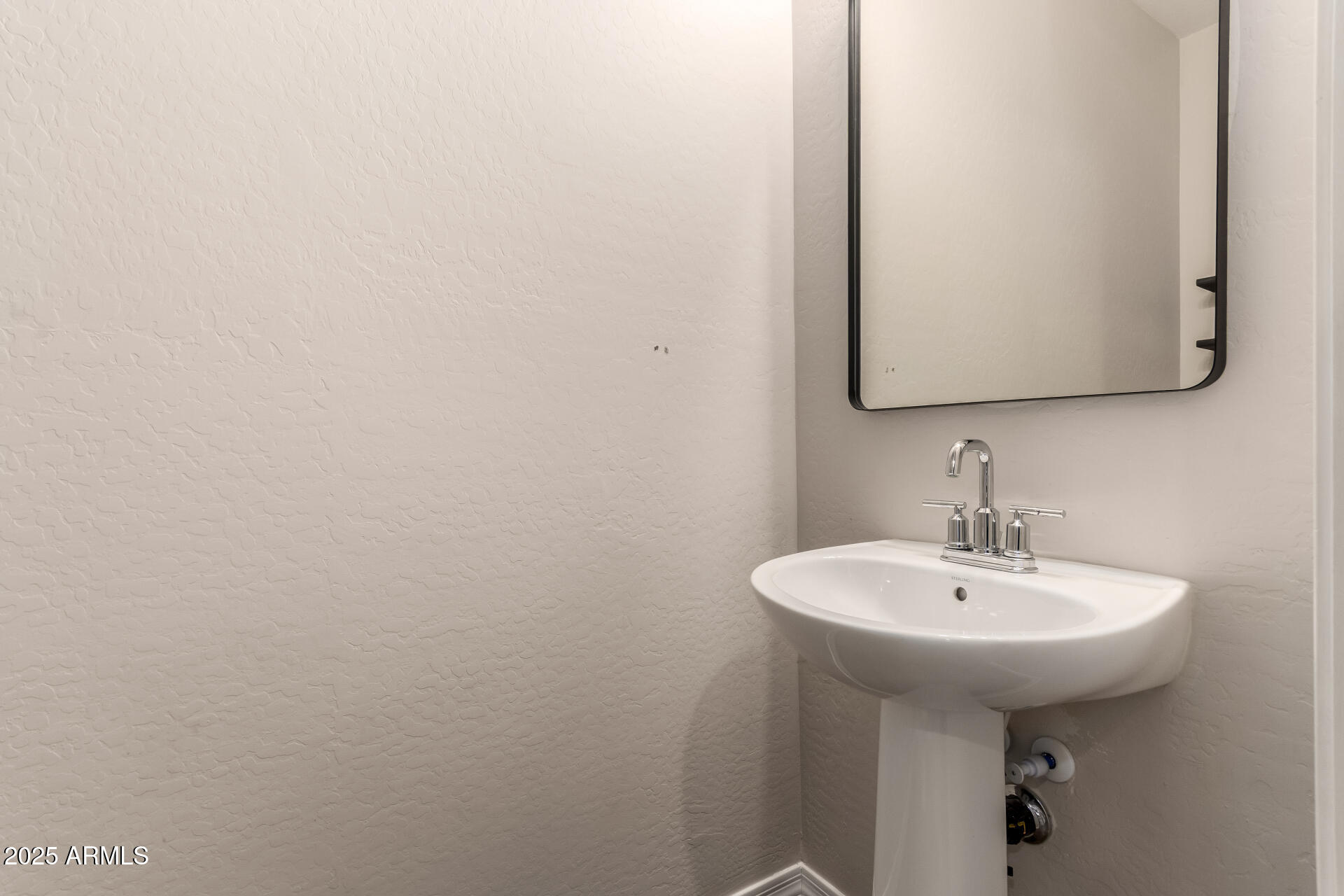 5418 South Vincent Mesa, AZ 85212 - Photo 19 of 38 a bathroom with a sink and a mirror