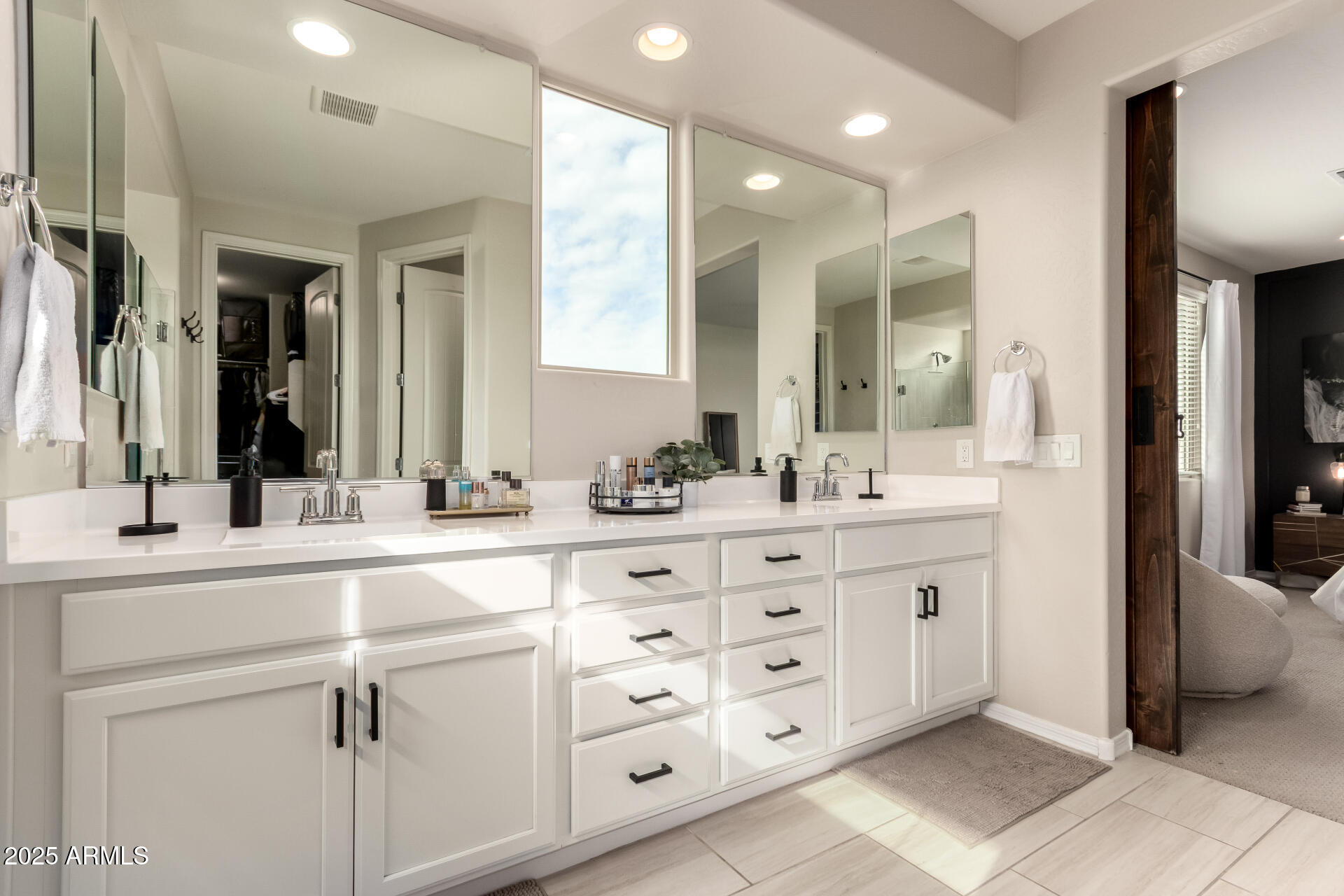 5418 South Vincent Mesa, AZ 85212 - Photo 24 of 38 a spacious bathroom with double sink and a mirror