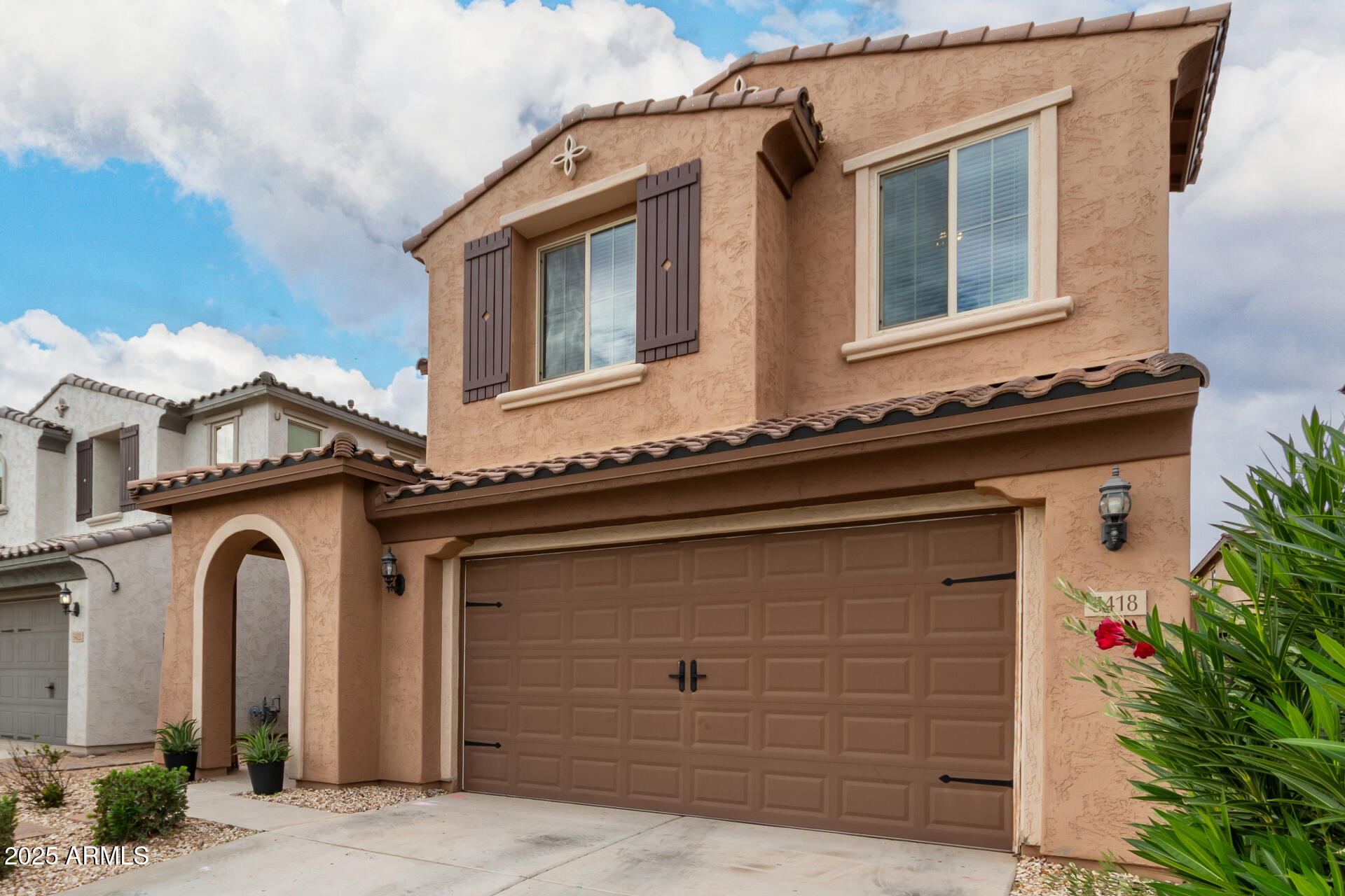 5418 South Vincent Mesa, AZ 85212 - Photo 5 of 38 a front view of a house with windows