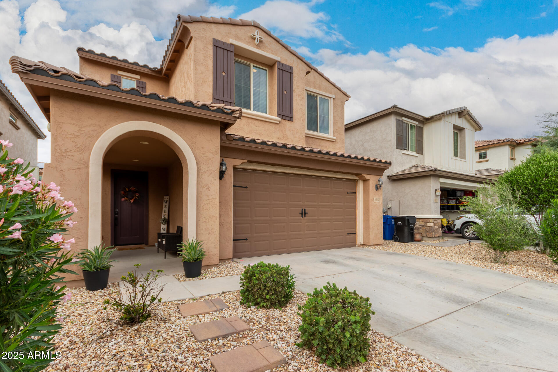5418 South Vincent Mesa, AZ 85212 - Photo 6 of 38 a front view of a house with garden