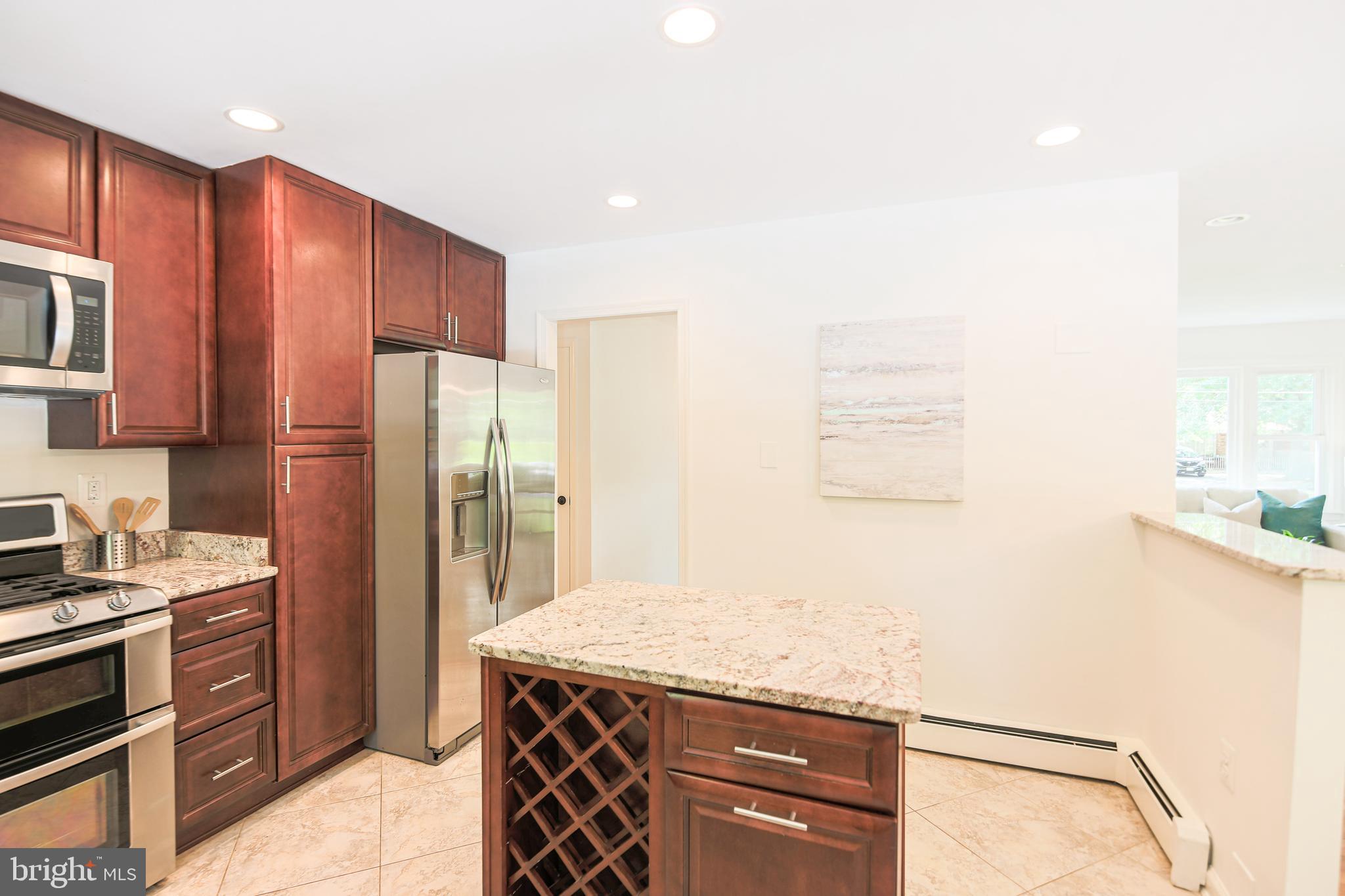 7200 Popkins Farm Road Alexandria, VA 22306 - Photo 18 of 70 Center Island Boasts Wine Storage