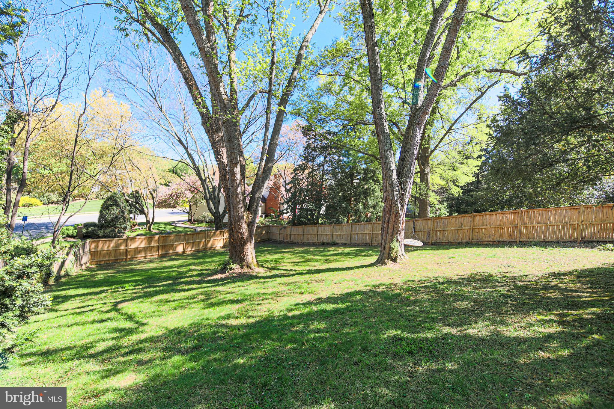 7200 Popkins Farm Road Alexandria, VA 22306 - Photo 28 of 70 Private Fenced Yard with Tree Swing