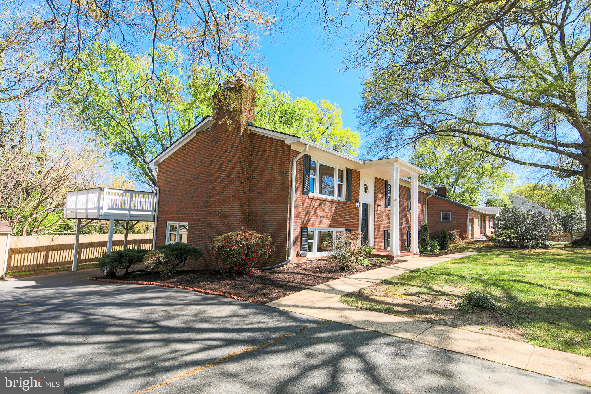 7200 Popkins Farm Road Alexandria, VA 22306 - Photo 69 of 70 View of Side of House, Driveway, & Deck