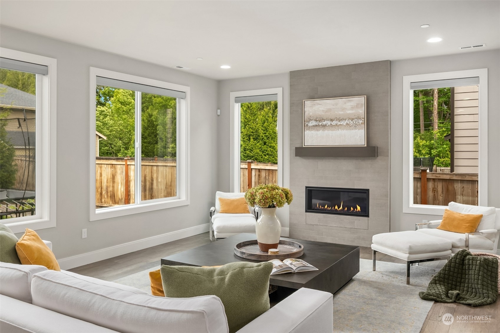 231 234th Place Southeast Bothell, WA 98021 - Photo 12 of 38 a living room with furniture and a fireplace