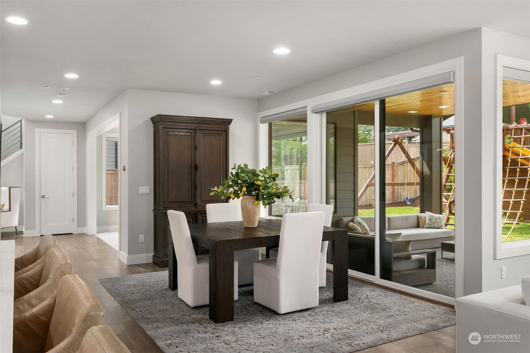 231 234th Place Southeast Bothell, WA 98021 - Photo 15 of 38 a dining room with furniture and a floor to ceiling window