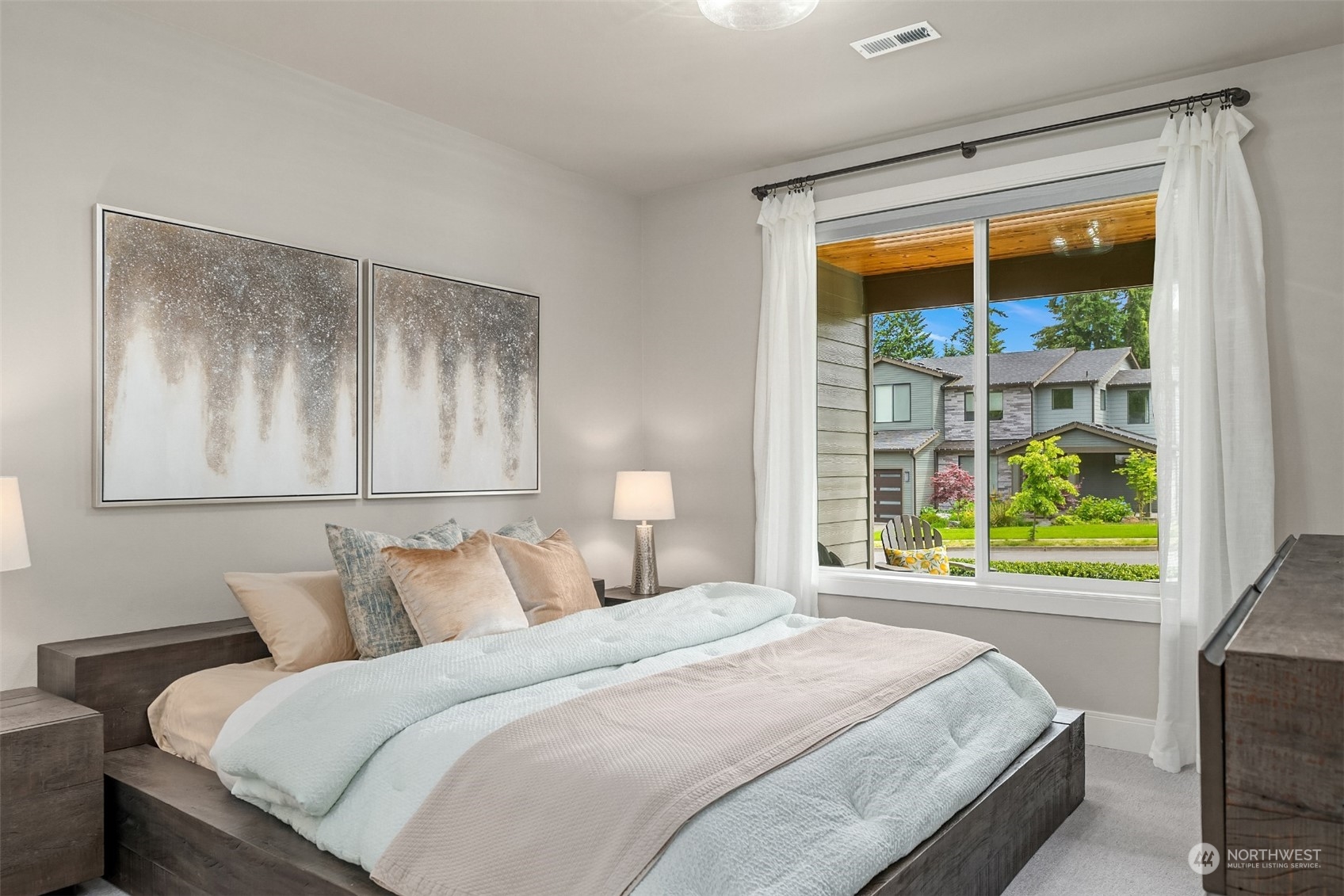 231 234th Place Southeast Bothell, WA 98021 - Photo 19 of 38 a bedroom with a bed and a window