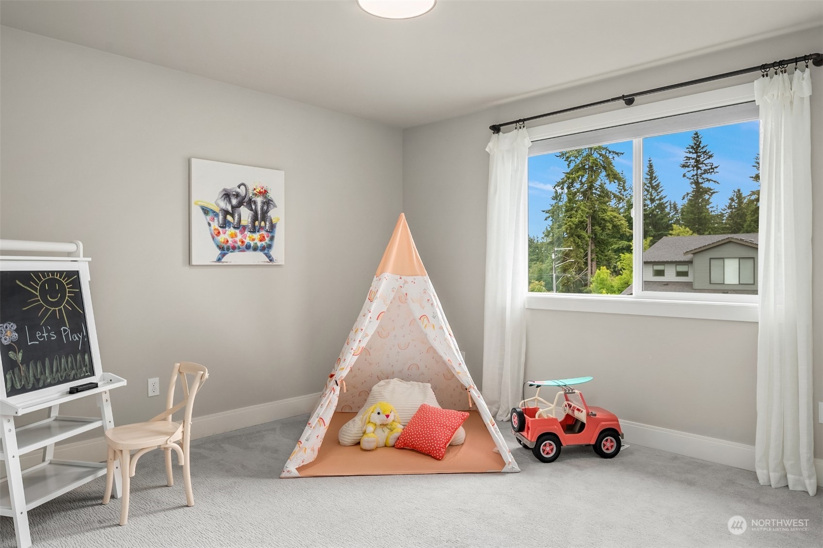 231 234th Place Southeast Bothell, WA 98021 - Photo 27 of 38 a bedroom with a bed and a window