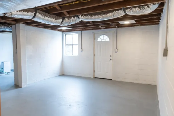 a large kitchen with cabinets